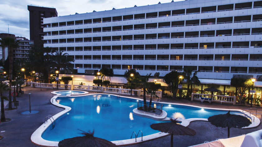 swimming pool hotel sunset